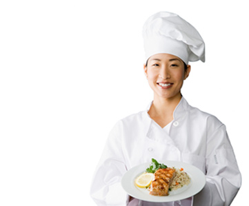 Chef holding a plate of food